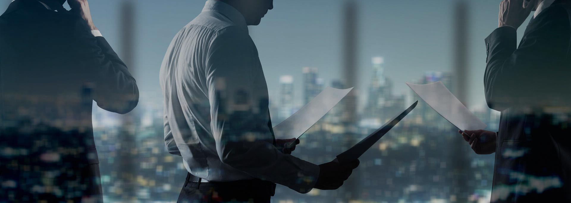 Berkeley Financial advisors reviewing documents over the London skyline